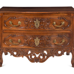 A Louis XV Provincial Carved Walnut