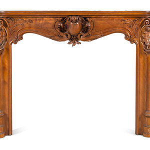A Louis XV Style Carved Walnut