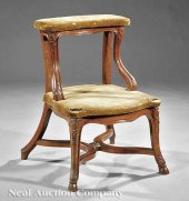 A Louis XV-Style Carved Walnut