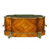 A LOUIS XV STYLE GILT BRONZE M