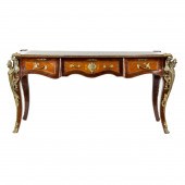 A LOUIS XV STYLE GILT METAL MO