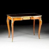A LOUIS XV STYLE GILT BRONZE M
