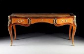 A LOUIS XV STYLE GILT BRONZE M