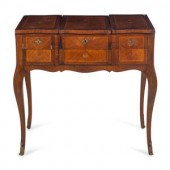 A Louis XV Style Inlaid Walnut