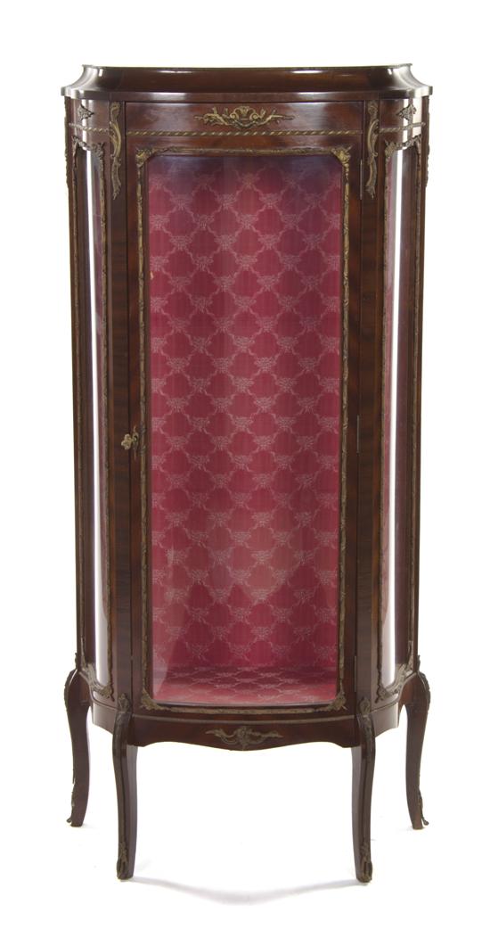 *A Louis XV Style Mahogany and Gilt