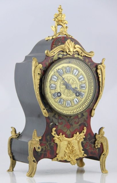 A Louis XV style ormolu mounted