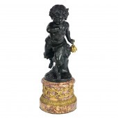A LOUIS XV STYLE PATINATED BRO
