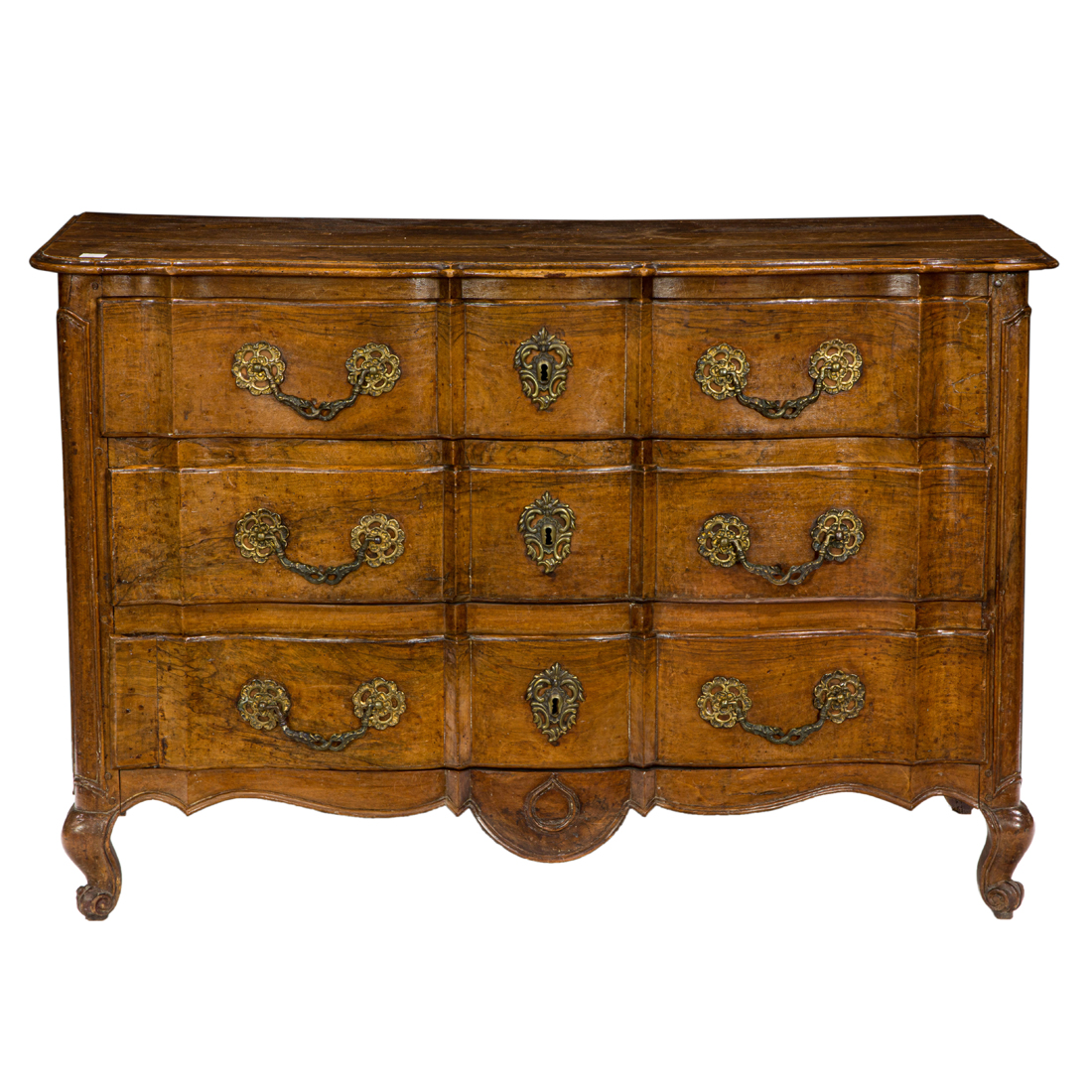 A LOUIS XV WALNUT COMMODE EN