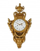 A LOUIS XVI GILT BRONZE CARTEL