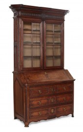 A LOUIS XVI PROVINCIAL OAK SEC