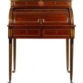 A Louis XVI Style Brass Mounte