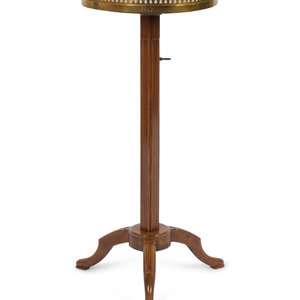 A Louis XVI Style Brass-Mounted