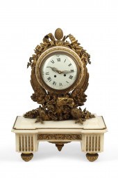 A LOUIS XVI STYLE BRONZE AND M