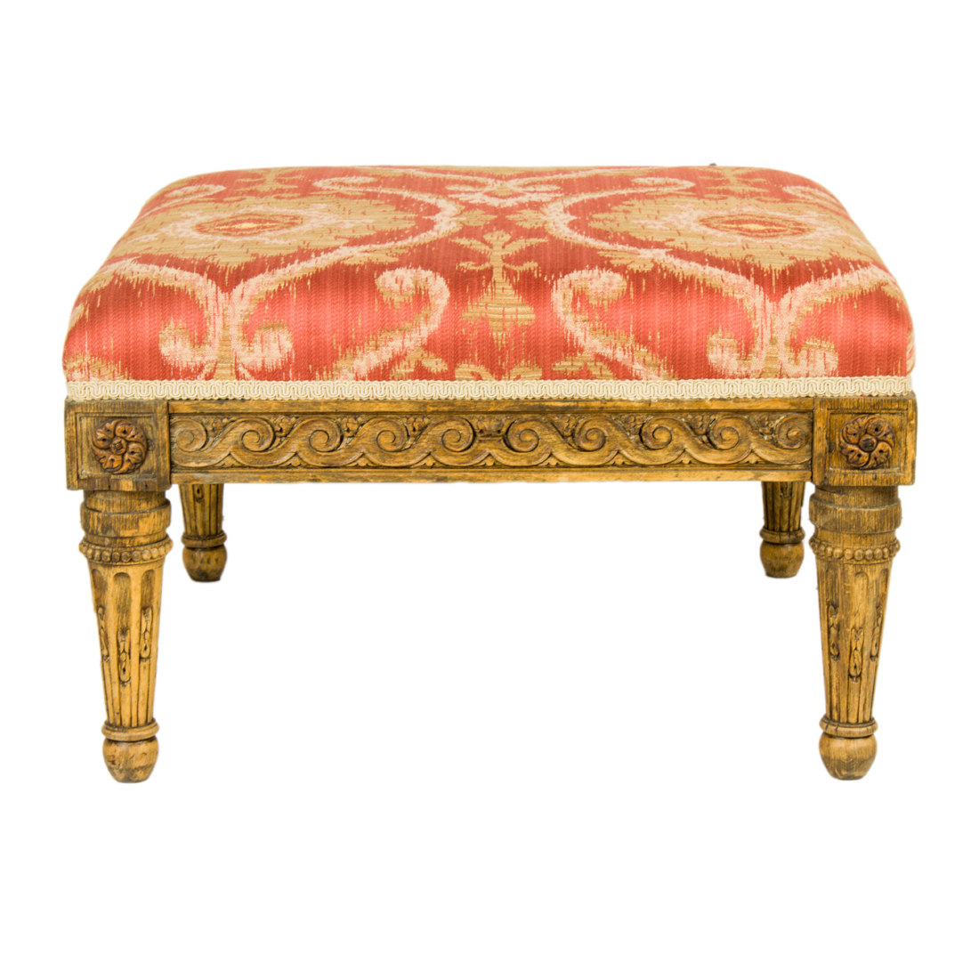 A LOUIS XVI STYLE CARVED STOOL