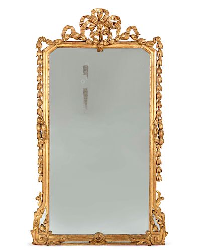 A LOUIS XVI STYLE CARVED GILTWOOD