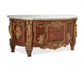 A LOUIS XVI-STYLE COMMODE AFTE