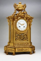 A Louis XVI style gilt bronze