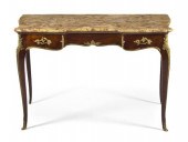 A Louis XVI Style Gilt Metal M