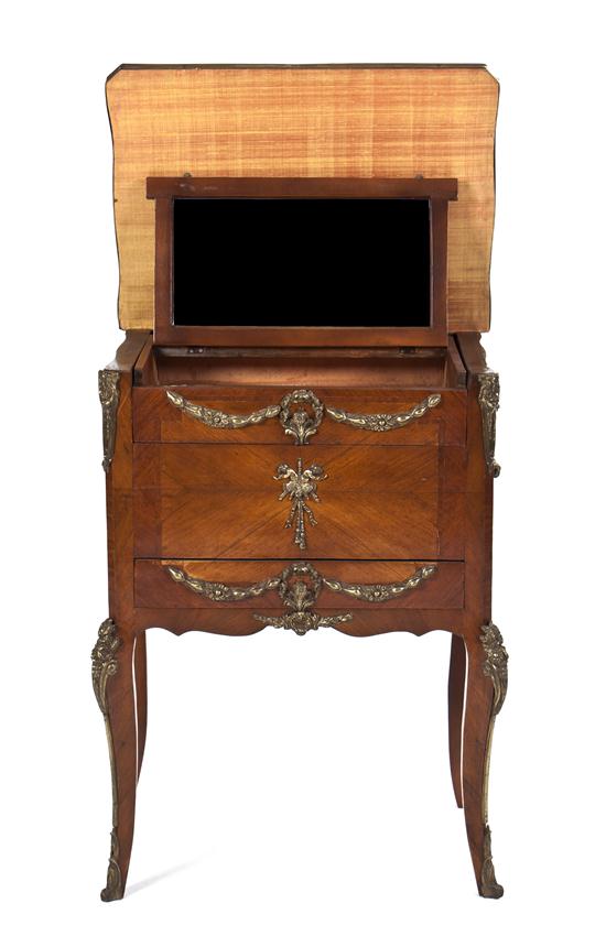 A Louis XVI Style Gilt Metal