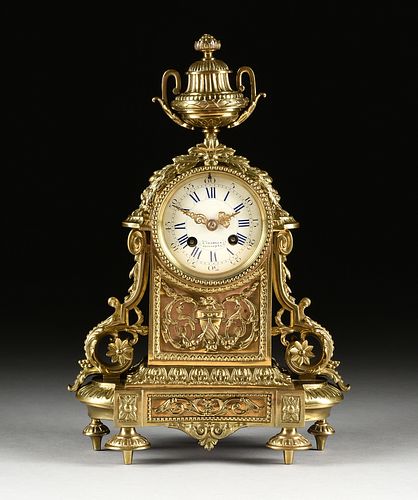 A LOUIS XVI STYLE GILT BRASS CLOCK,