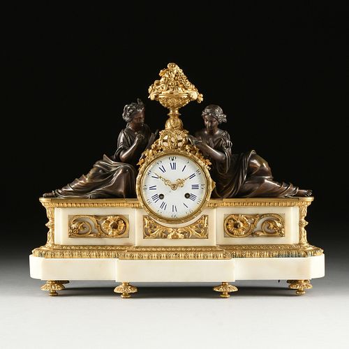 A LOUIS XVI STYLE GILT AND