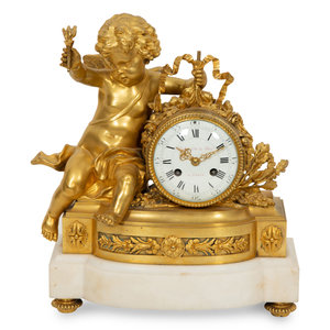 A Louis XVI Style Gilt Bronze and