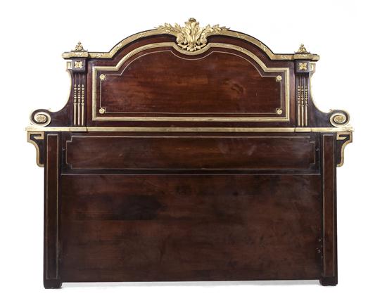 A Louis XVI Style Mahogany and Gilt
