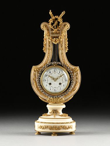 A LOUIS XVI STYLE ORMOLU AND FAUX