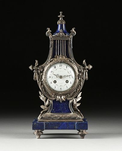 A LOUIS XVI STYLE SILVERED METAL