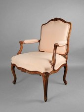 A LOUIS XVTH STYLE OPEN ARMCHA