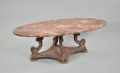 A Low Marble Top Table With an