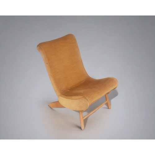 A LOW MID-CENTURY TEAK SPRING
