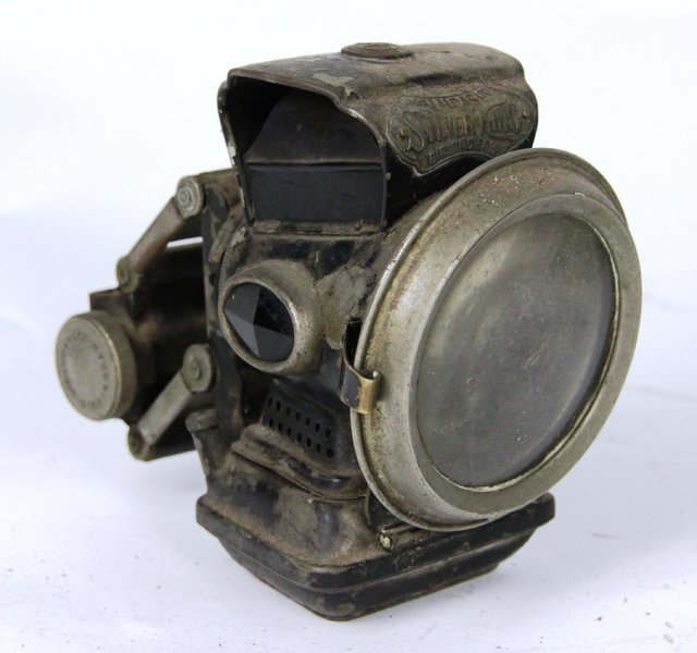 A Lucas Silver King ebonised oil
