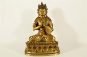A MAGNIFICENT GILT-BRONZE FIGU