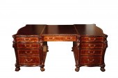 A MAHOGANY AND CROSSBANDED PAR