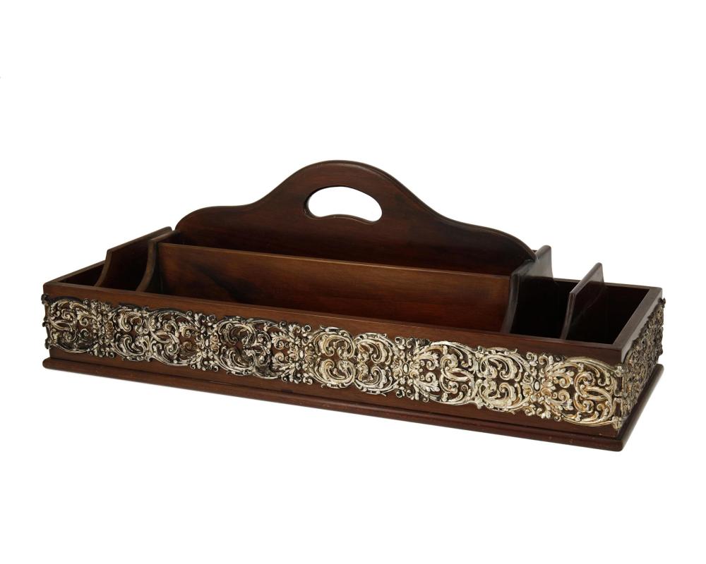 A MAHOGANY AND REPOUSSé SILVER