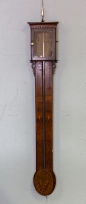 A mahogany and satinwood stick