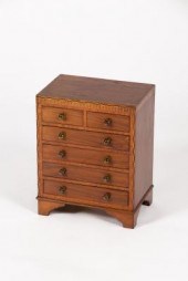 A mahogany apprentice chest wi