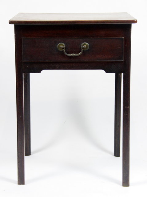 A mahogany bedside table fitted a