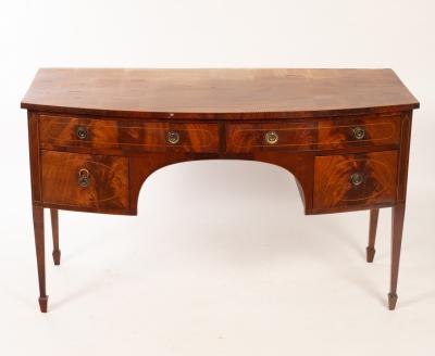 A mahogany bowfront sideboard on