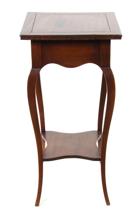 A Mahogany Brass and