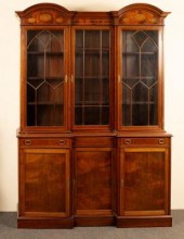 A mahogany breakfront bookcase