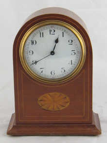 A mahogany cased mantel clock