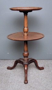 A mahogany circular two tier d
