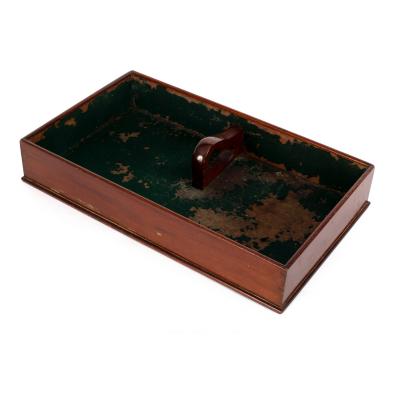 A mahogany cutlery hod with central