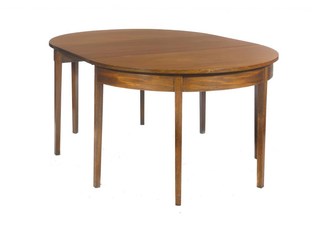 A MAHOGANY DINING TABLE the
