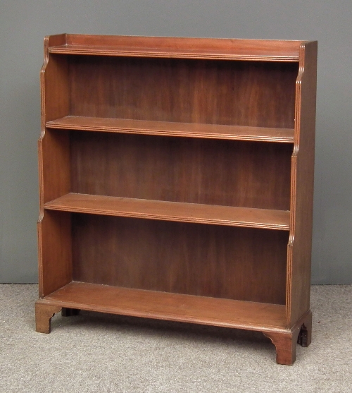A mahogany four tier open front