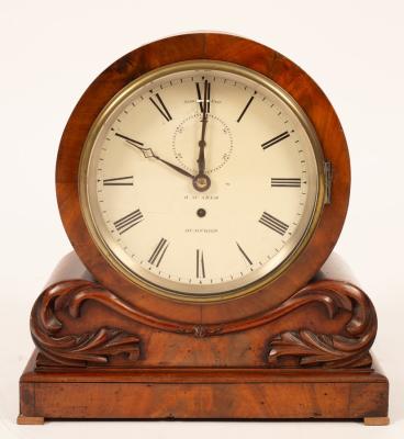 A mahogany mantel timepiece of