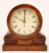 A mahogany mantel timepiece of