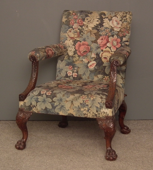 A mahogany open arm easy chair of